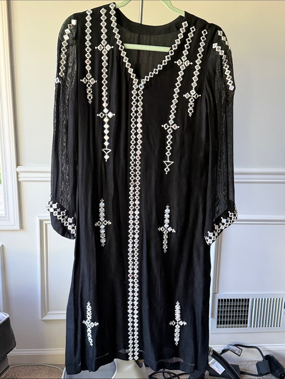 Black Embroidered V-Neck Women's kurta with mirror work.